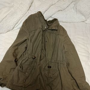 Green coat with pockets.